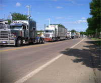 Semis lined up to participate in parade.