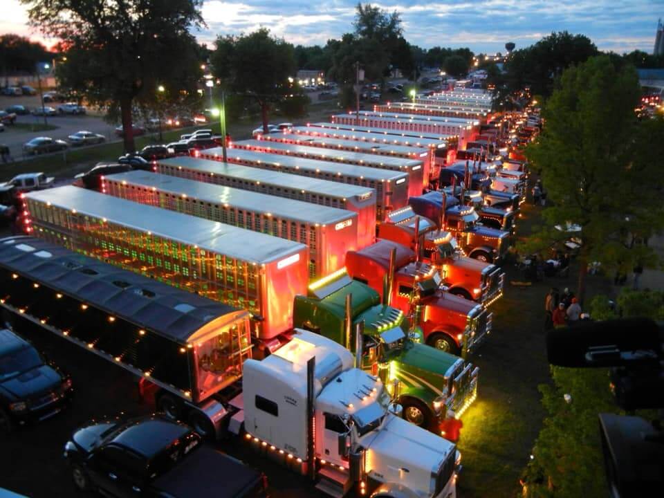 Semi with lights on at night